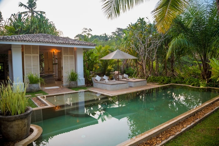 Private resort villa with tranquil pool, lush tropical gardens, and intimate outdoor lounge